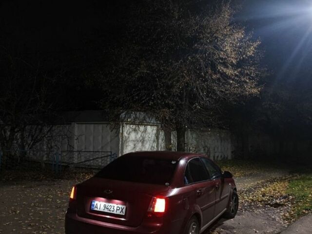 Красный Шевроле Лачетти, объемом двигателя 1.8 л и пробегом 287 тыс. км за 3300 $, фото 7 на Automoto.ua