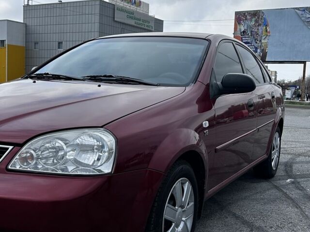 Красный Шевроле Лачетти, объемом двигателя 1.6 л и пробегом 222 тыс. км за 3999 $, фото 8 на Automoto.ua