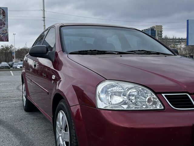 Красный Шевроле Лачетти, объемом двигателя 1.6 л и пробегом 222 тыс. км за 3999 $, фото 9 на Automoto.ua