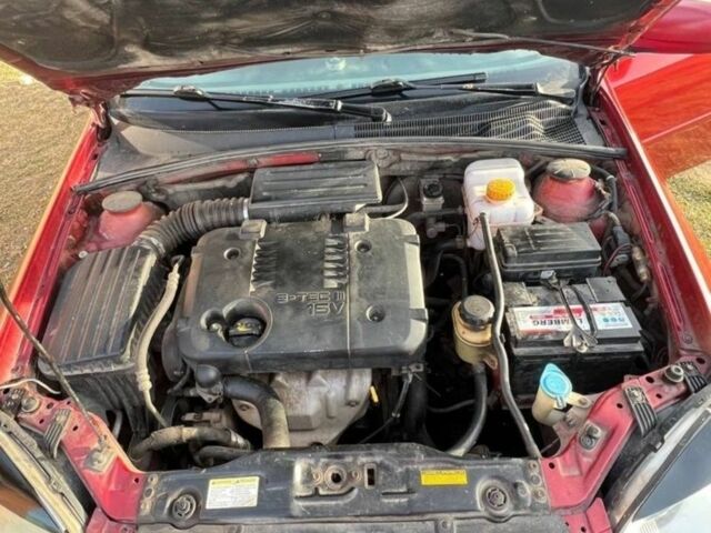 Красный Шевроле Лачетти, объемом двигателя 1.8 л и пробегом 328 тыс. км за 1800 $, фото 2 на Automoto.ua