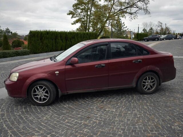 Красный Шевроле Лачетти, объемом двигателя 1.8 л и пробегом 365 тыс. км за 2800 $, фото 7 на Automoto.ua