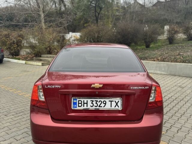 Червоний Шевроле Лачетті, об'ємом двигуна 1.8 л та пробігом 267 тис. км за 3900 $, фото 4 на Automoto.ua
