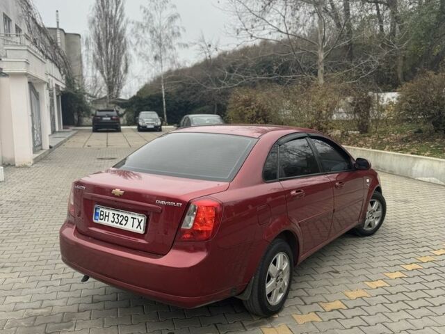 Червоний Шевроле Лачетті, об'ємом двигуна 1.8 л та пробігом 267 тис. км за 3900 $, фото 3 на Automoto.ua