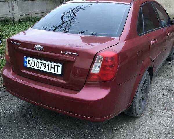 Красный Шевроле Лачетти, объемом двигателя 1.8 л и пробегом 250 тыс. км за 2700 $, фото 2 на Automoto.ua