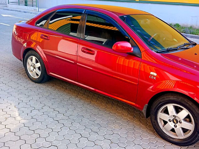 Красный Шевроле Лачетти, объемом двигателя 1.8 л и пробегом 180 тыс. км за 4550 $, фото 2 на Automoto.ua