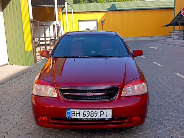 Красный Шевроле Лачетти, объемом двигателя 1.8 л и пробегом 180 тыс. км за 4550 $, фото 1 на Automoto.ua