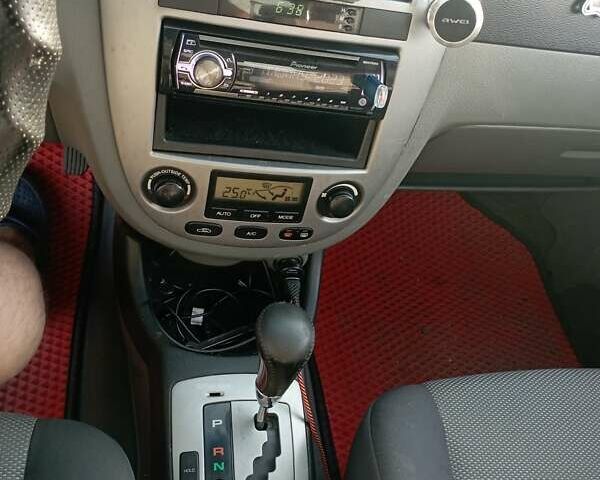 Красный Шевроле Лачетти, объемом двигателя 1.8 л и пробегом 283 тыс. км за 4400 $, фото 2 на Automoto.ua