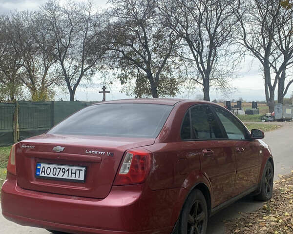 Красный Шевроле Лачетти, объемом двигателя 1.8 л и пробегом 250 тыс. км за 1850 $, фото 2 на Automoto.ua