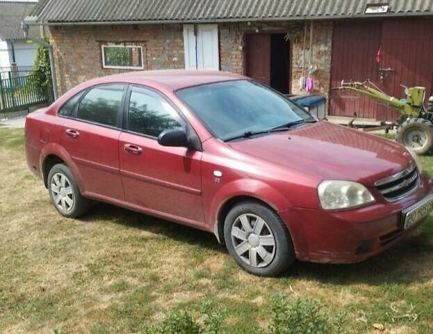 Красный Шевроле Лачетти, объемом двигателя 1.6 л и пробегом 235 тыс. км за 3850 $, фото 1 на Automoto.ua