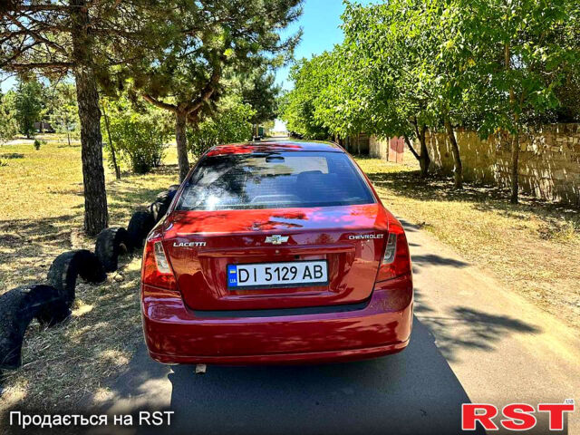 Красный Шевроле Лачетти, объемом двигателя 1.8 л и пробегом 185 тыс. км за 3900 $, фото 3 на Automoto.ua