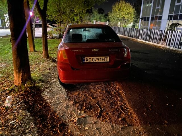 Красный Шевроле Лачетти, объемом двигателя 1.8 л и пробегом 240 тыс. км за 2000 $, фото 1 на Automoto.ua