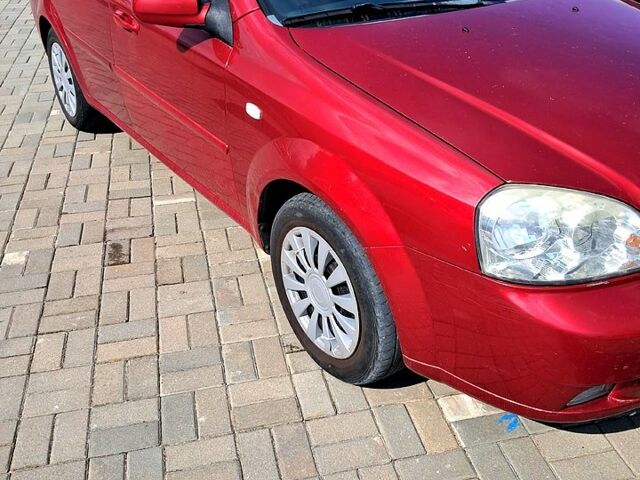 Червоний Шевроле Лачетті, об'ємом двигуна 1.4 л та пробігом 152 тис. км за 4200 $, фото 2 на Automoto.ua