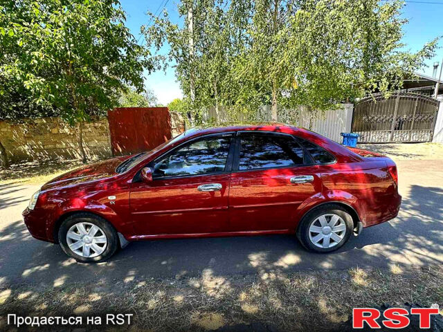 Красный Шевроле Лачетти, объемом двигателя 1.8 л и пробегом 185 тыс. км за 3900 $, фото 1 на Automoto.ua