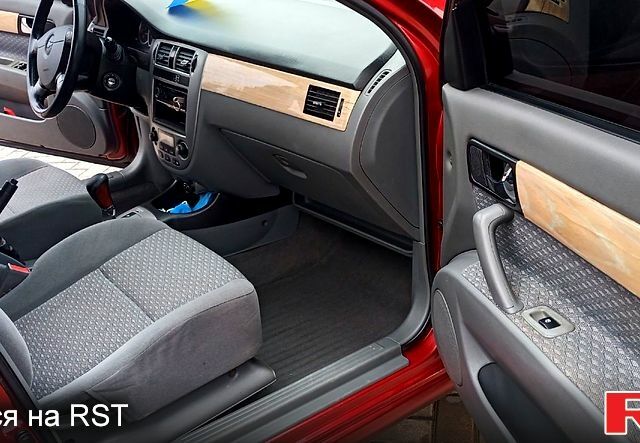 Червоний Шевроле Лачетті, об'ємом двигуна 1.8 л та пробігом 228 тис. км за 4400 $, фото 6 на Automoto.ua