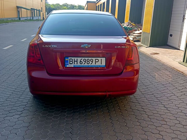 Красный Шевроле Лачетти, объемом двигателя 1.8 л и пробегом 180 тыс. км за 4550 $, фото 5 на Automoto.ua