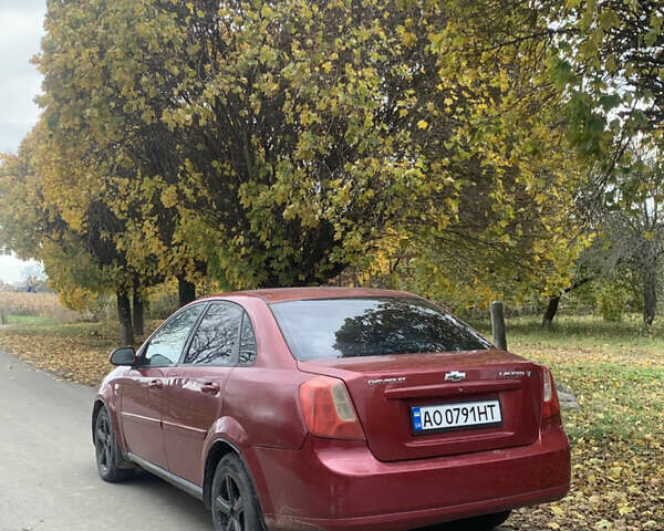 Красный Шевроле Лачетти, объемом двигателя 1.8 л и пробегом 250 тыс. км за 1850 $, фото 3 на Automoto.ua