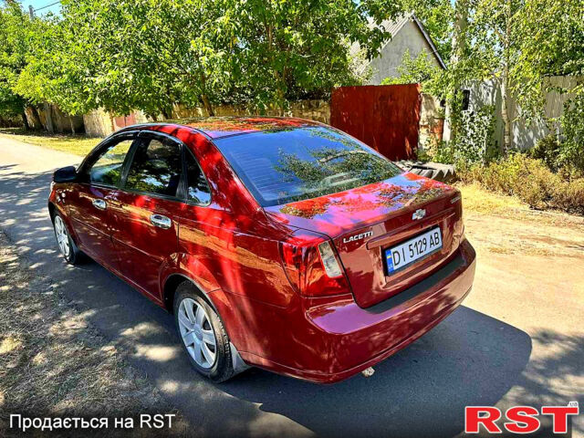 Красный Шевроле Лачетти, объемом двигателя 1.8 л и пробегом 185 тыс. км за 3900 $, фото 2 на Automoto.ua