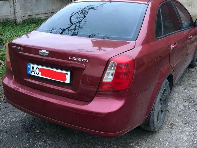 Красный Шевроле Лачетти, объемом двигателя 1.8 л и пробегом 250 тыс. км за 800 $, фото 1 на Automoto.ua