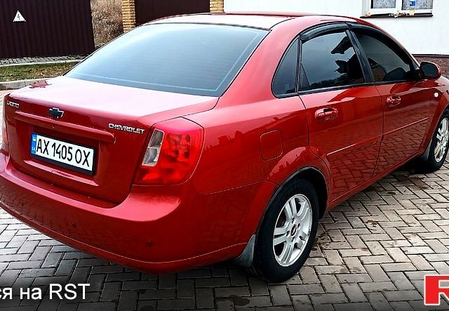 Червоний Шевроле Лачетті, об'ємом двигуна 1.8 л та пробігом 228 тис. км за 4400 $, фото 3 на Automoto.ua