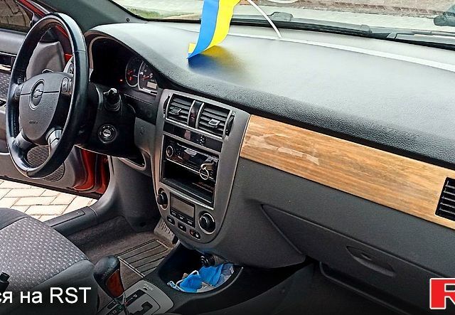 Червоний Шевроле Лачетті, об'ємом двигуна 1.8 л та пробігом 228 тис. км за 4400 $, фото 10 на Automoto.ua