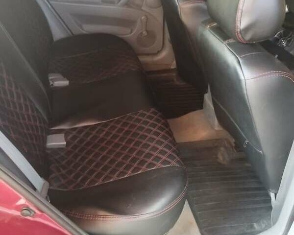 Красный Шевроле Лачетти, объемом двигателя 1.6 л и пробегом 235 тыс. км за 3850 $, фото 5 на Automoto.ua