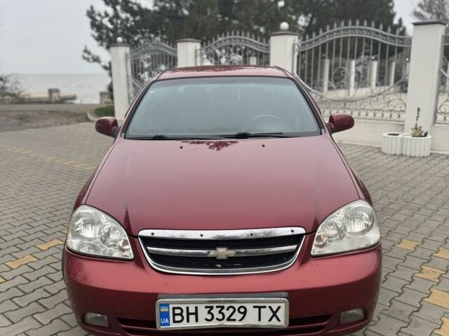 Червоний Шевроле Лачетті, об'ємом двигуна 1.8 л та пробігом 267 тис. км за 3900 $, фото 1 на Automoto.ua
