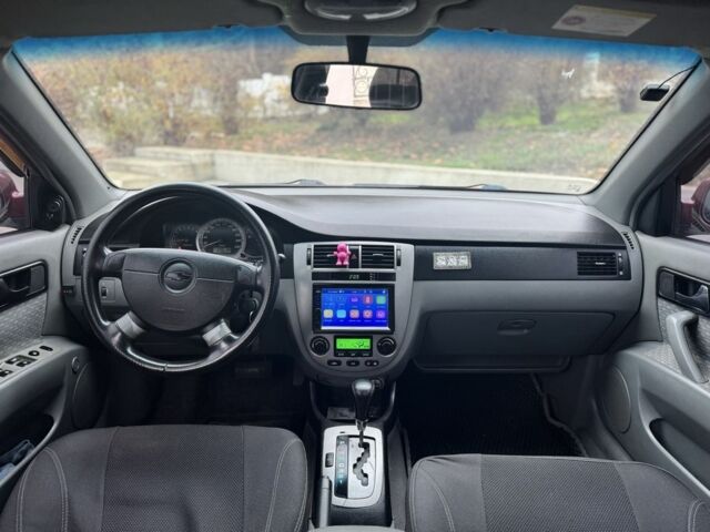 Червоний Шевроле Лачетті, об'ємом двигуна 1.8 л та пробігом 267 тис. км за 3900 $, фото 6 на Automoto.ua