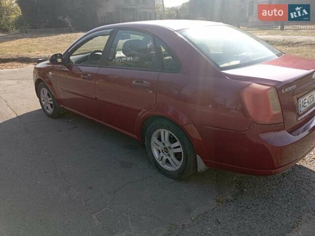 Красный Шевроле Лачетти, объемом двигателя 1.8 л и пробегом 283 тыс. км за 4400 $, фото 7 на Automoto.ua