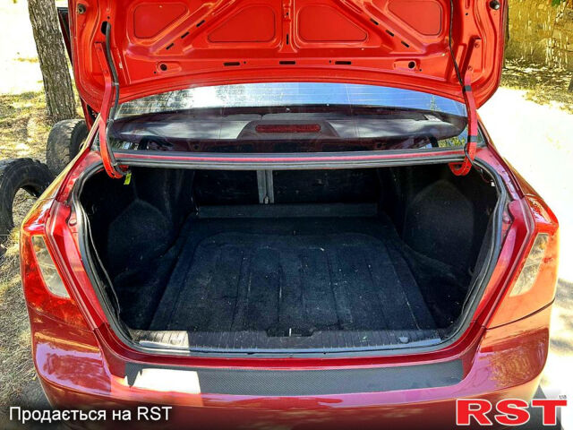 Красный Шевроле Лачетти, объемом двигателя 1.8 л и пробегом 185 тыс. км за 3900 $, фото 10 на Automoto.ua