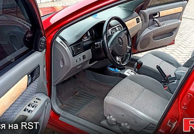 Червоний Шевроле Лачетті, об'ємом двигуна 1.8 л та пробігом 228 тис. км за 4400 $, фото 4 на Automoto.ua