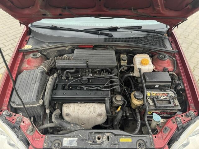 Червоний Шевроле Лачетті, об'ємом двигуна 1.8 л та пробігом 267 тис. км за 3900 $, фото 7 на Automoto.ua