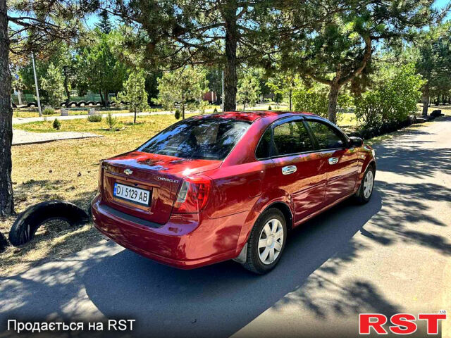 Красный Шевроле Лачетти, объемом двигателя 1.8 л и пробегом 185 тыс. км за 3900 $, фото 4 на Automoto.ua