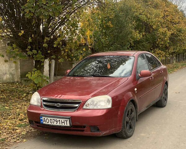 Красный Шевроле Лачетти, объемом двигателя 1.8 л и пробегом 250 тыс. км за 1850 $, фото 1 на Automoto.ua