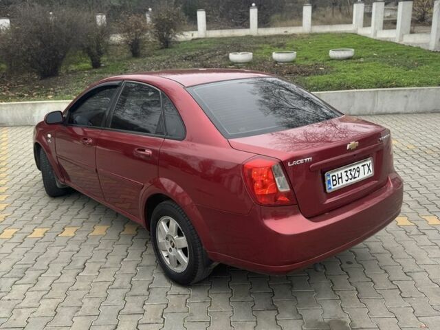Червоний Шевроле Лачетті, об'ємом двигуна 1.8 л та пробігом 267 тис. км за 3900 $, фото 5 на Automoto.ua