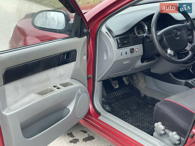 Красный Шевроле Лачетти, объемом двигателя 1.6 л и пробегом 223 тыс. км за 3700 $, фото 22 на Automoto.ua
