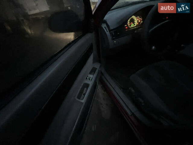 Красный Шевроле Лачетти, объемом двигателя 1.8 л и пробегом 305 тыс. км за 1850 $, фото 9 на Automoto.ua