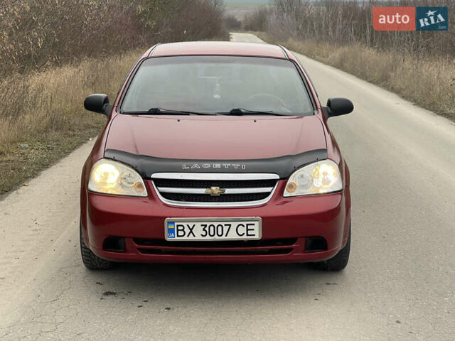 Красный Шевроле Лачетти, объемом двигателя 1.6 л и пробегом 223 тыс. км за 3700 $, фото 7 на Automoto.ua