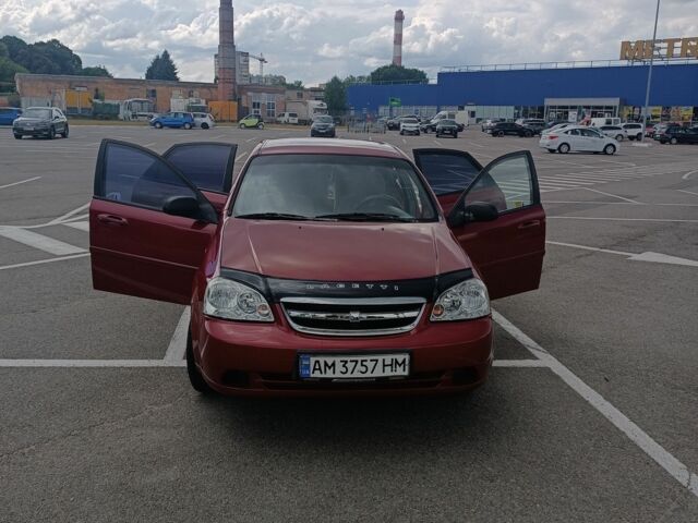 Червоний Шевроле Лачетті, об'ємом двигуна 1.6 л та пробігом 265 тис. км за 3099 $, фото 7 на Automoto.ua