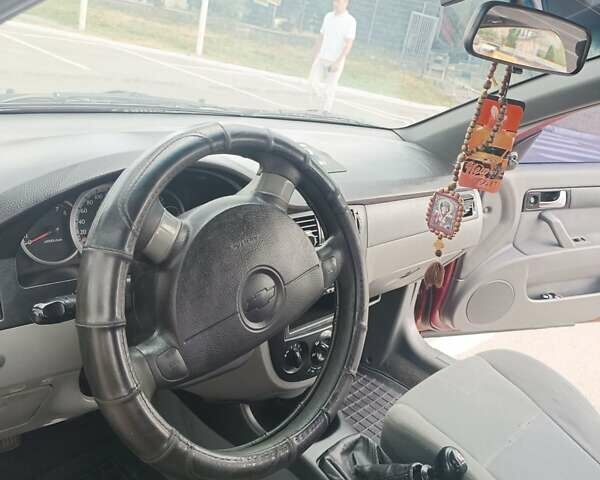 Червоний Шевроле Лачетті, об'ємом двигуна 1.6 л та пробігом 265 тис. км за 3000 $, фото 4 на Automoto.ua