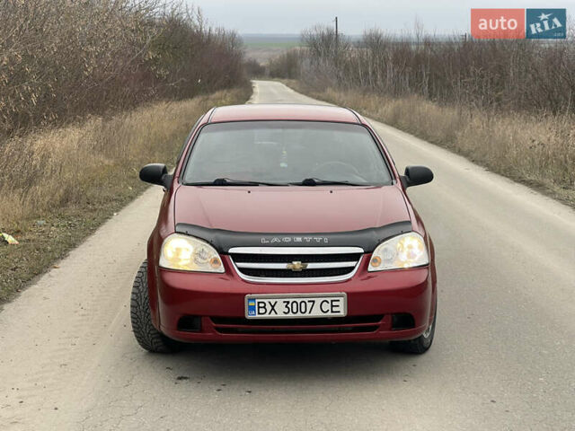 Красный Шевроле Лачетти, объемом двигателя 1.6 л и пробегом 223 тыс. км за 3700 $, фото 4 на Automoto.ua