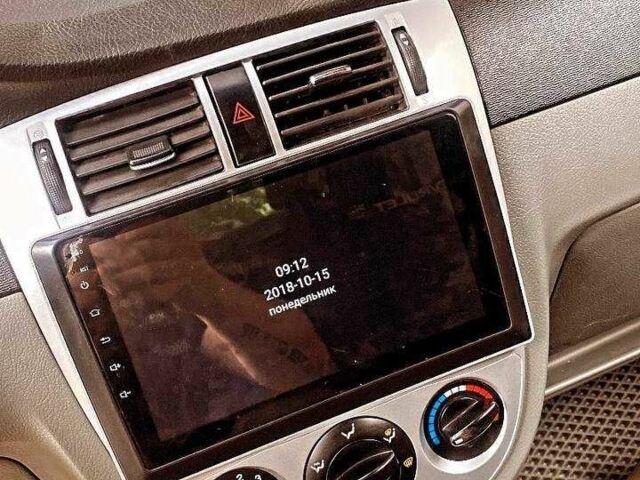 Красный Шевроле Лачетти, объемом двигателя 1.8 л и пробегом 211 тыс. км за 5200 $, фото 7 на Automoto.ua