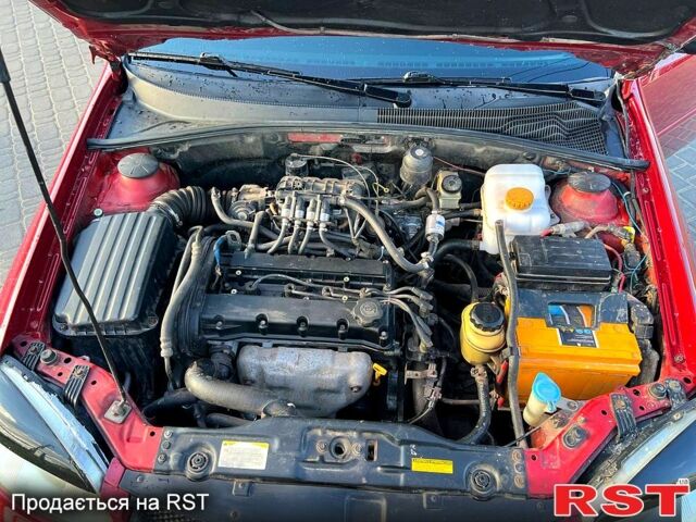 Червоний Шевроле Лачетті, об'ємом двигуна 1.6 л та пробігом 267 тис. км за 4300 $, фото 9 на Automoto.ua