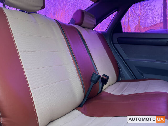 Красный Шевроле Лачетти, объемом двигателя 1.6 л и пробегом 256 тыс. км за 4300 $, фото 21 на Automoto.ua