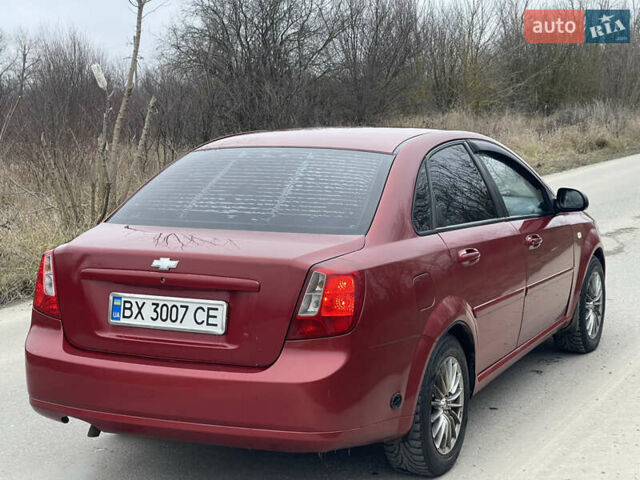 Красный Шевроле Лачетти, объемом двигателя 1.6 л и пробегом 223 тыс. км за 3700 $, фото 19 на Automoto.ua