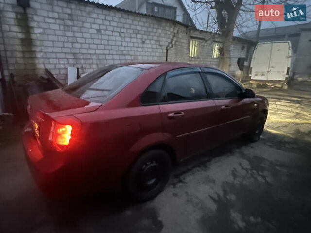 Красный Шевроле Лачетти, объемом двигателя 1.8 л и пробегом 305 тыс. км за 1850 $, фото 2 на Automoto.ua