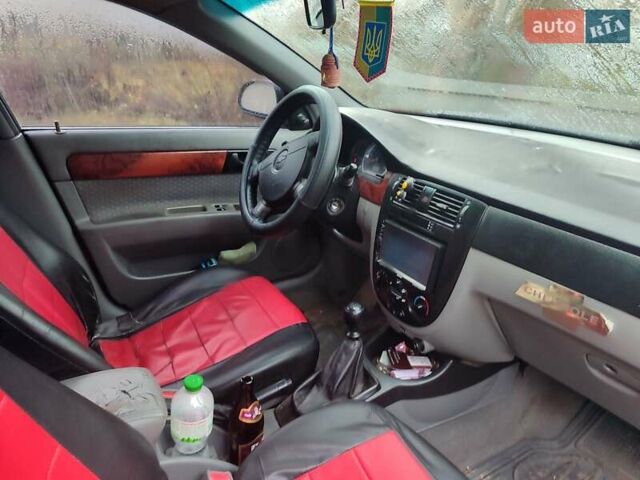 Красный Шевроле Лачетти, объемом двигателя 1.6 л и пробегом 296 тыс. км за 2900 $, фото 5 на Automoto.ua