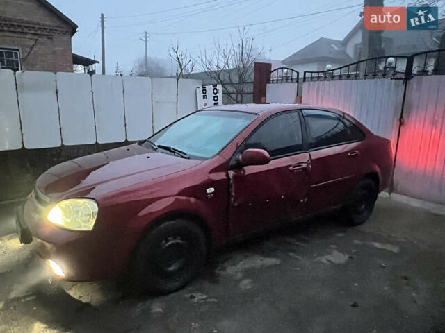 Красный Шевроле Лачетти, объемом двигателя 1.8 л и пробегом 305 тыс. км за 1850 $, фото 4 на Automoto.ua