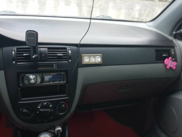 Красный Шевроле Лачетти, объемом двигателя 1.6 л и пробегом 143 тыс. км за 3800 $, фото 1 на Automoto.ua