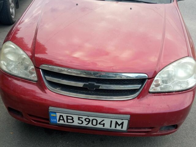 Красный Шевроле Лачетти, объемом двигателя 1.6 л и пробегом 143 тыс. км за 3800 $, фото 9 на Automoto.ua