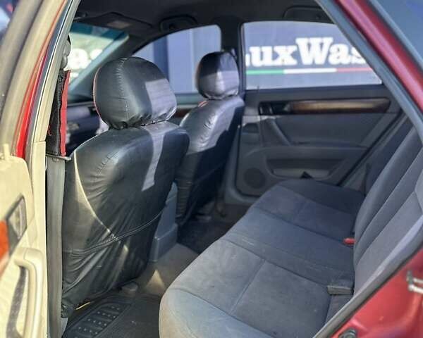 Красный Шевроле Лачетти, объемом двигателя 1.6 л и пробегом 280 тыс. км за 3200 $, фото 9 на Automoto.ua